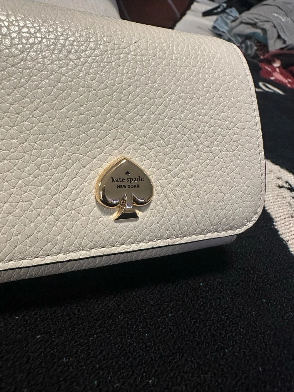 kate spade cream pebbled leather small zip wallet with gold spade emblem